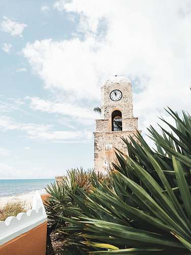 worth avenue beige stone wall clock tower palm beach